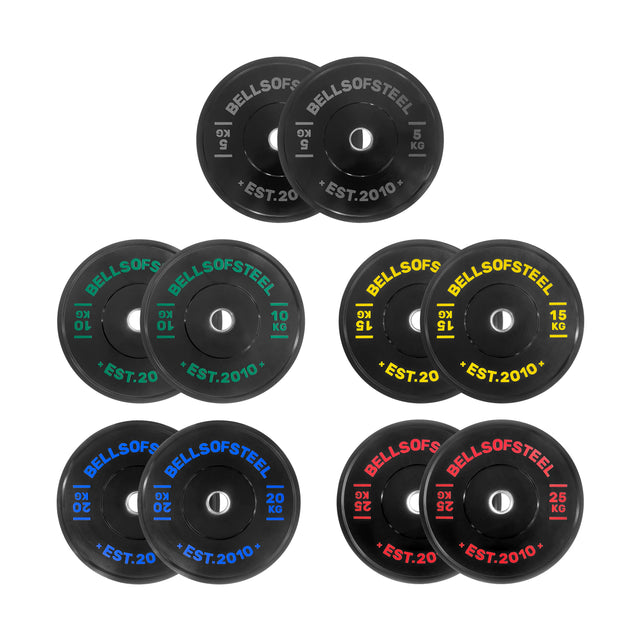 Six pairs of Bells of Steel Dead Bounce Conflict Bumper Plate Sets are displayed in black with colored lettering—25 kg (red), 20 kg (blue), 15 kg (yellow), and 10 kg (green)—showcasing their dead bounce on a white background.