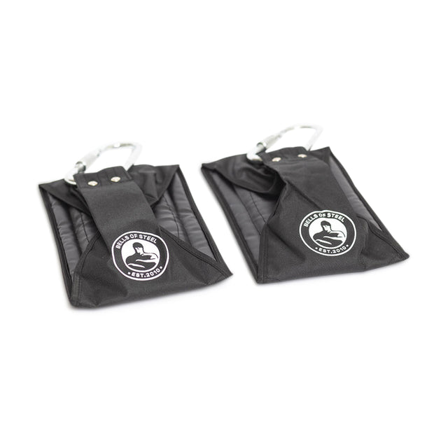 A pair of Bells of Steel Hanging Ab Straps with metal carabiners provide sturdy arm support for intense core workouts. Each black fabric strap features the "Hands of Steel" logo on the front.