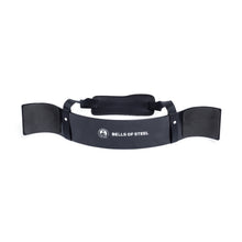 The Bells of Steel Arm Blaster is a black weightlifting accessory with padded straps and a white logo, designed for bicep curls and tricep pushdown support.