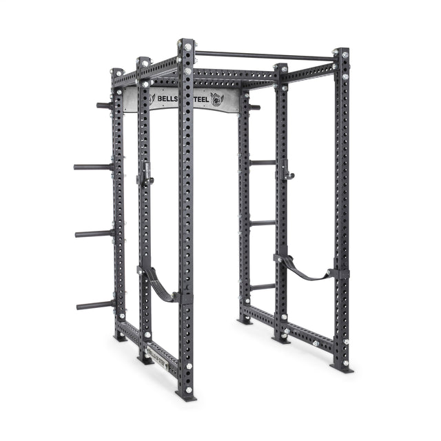 The Manticore Six Post Power Rack Builder by Bells of Steel is black and silver, boasts a 1,000-pound capacity with 1" adjustable holes, and features a pull-up bar and side spotter arms.