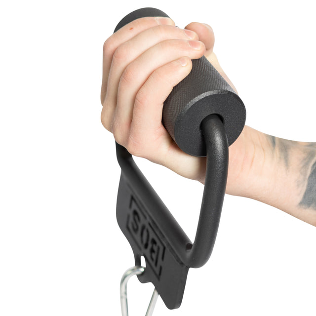A hand grips the Bells of Steel Fat Bar - Single D Handle, a black metal weightlifting accessory with a textured finish and visible “Soe” logo. A forearm tattoo highlights grip strength against a white background.