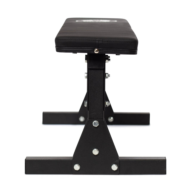 The Bells of Steel Flat Utility Bench in black features a padded top and robust metal frame, shown front-facing against a white background—an ideal sturdy workout bench for any home gym.