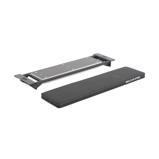 A Bells of Steel Utility Seat for Hydra/Manticore and an adjustable, foldable bench frame are shown side by side on a white background. The frame is compatible with most 3"x3" racks.