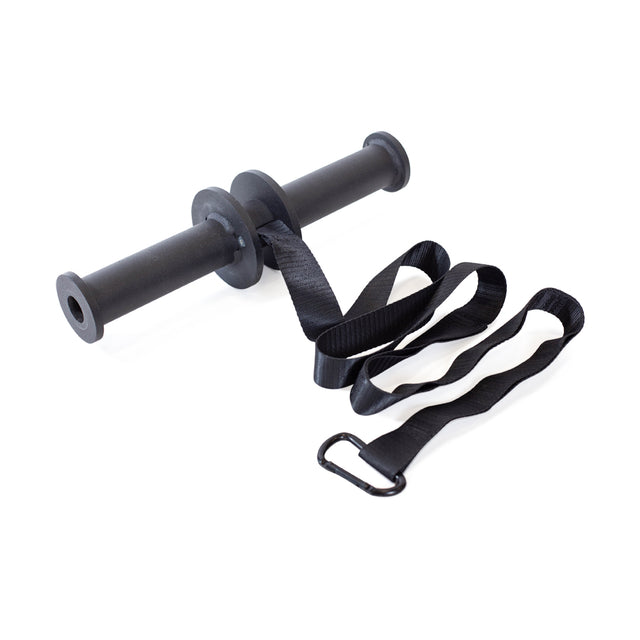 The Bells of Steel Wrist Roller and Rack Attachment is a black forearm trainer with two handles, a central spindle, and an attached strap ending in a metal carabiner. The coiled strap lies next to the roller for easy setup.
