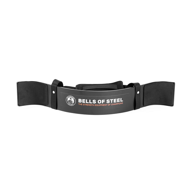The Bells of Steel Arm Blaster is black with padded straps and “BELLS OF STEEL, THE STRENGTH EQUIPMENT OF CHAMPIONS” on the front, designed to provide superior support during bicep curls and weightlifting.