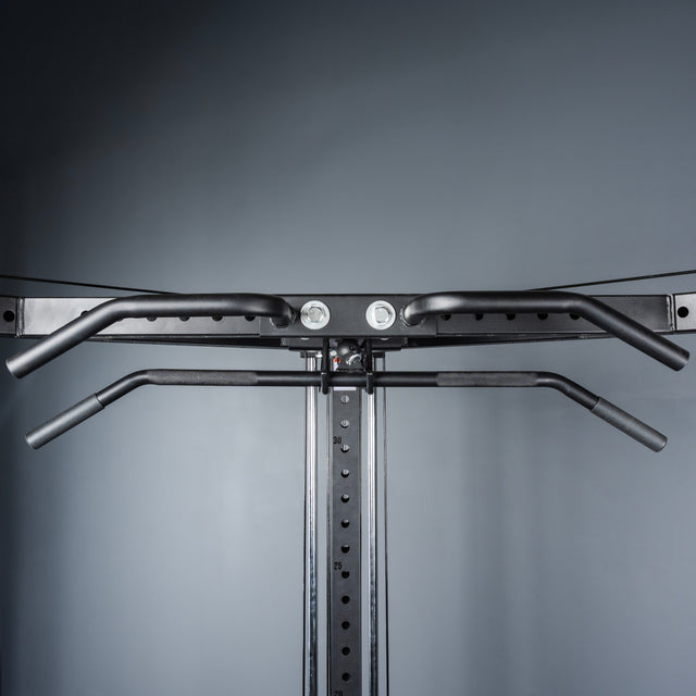 A close-up of the Bells of Steel All-in-One Trainer features a pull-up and chin-up bar with multiple grip options, shown against a plain gray background, ideal for diverse home gym exercises.