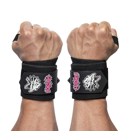 Two hands with black wrist wraps featuring wolf head and claw designs in white and red; both fists are clenched and facing forward, showing the wrist support wraps.