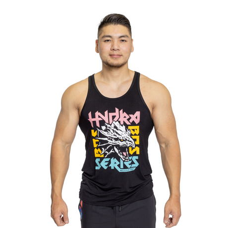 A man in a black tank top with colorful text and a dragon graphic stands facing forward against a white background.