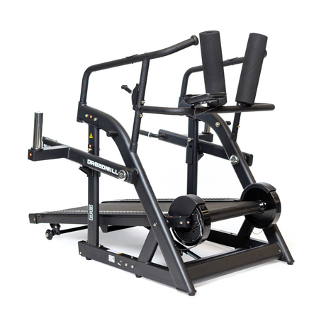 A black self-powered curved treadmill with handlebars, footrests, and weight holders, designed for strength and conditioning workouts. The brand name "DRAGONWILL" is visible on the side.