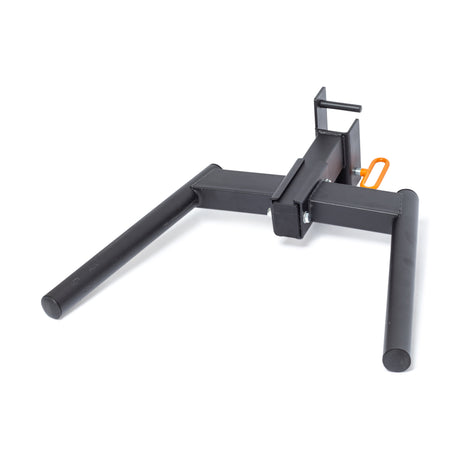 Black metal log grapple attachment with two parallel arms, a central mounting bracket, and an orange safety latch, designed for use with heavy machinery such as tractors or skid steers.