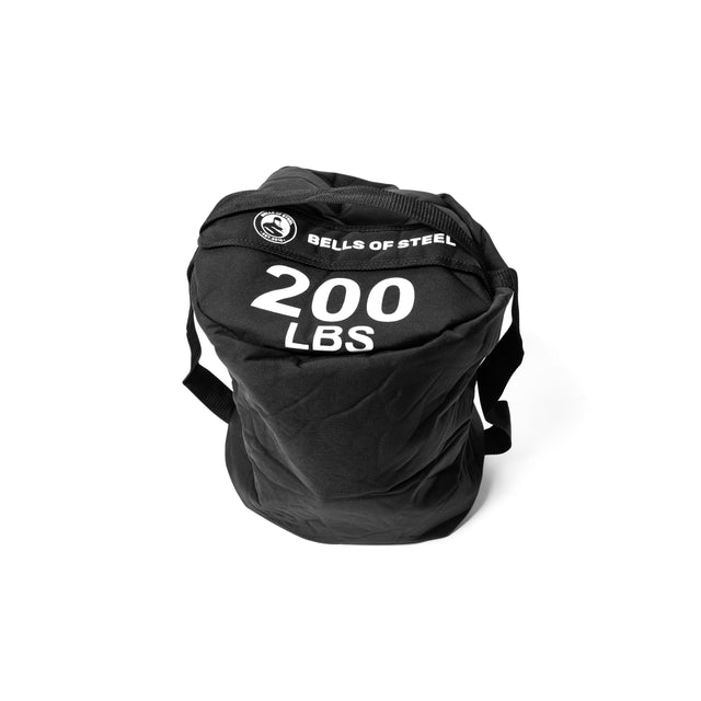 A black Bells of Steel Fitness Sandbag labeled "200 LBS" in white text, made from durable Condura and featuring handles, is displayed against a white background.