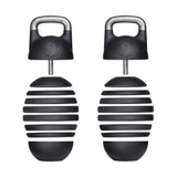 Two adjustable black shoe stretchers, akin to the precision of Bells of Steel's Adjustable Competition Kettlebell, feature a rounded, ribbed design and metal knobs for a customizable fit.
