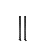 Two Manticore Vertical Uprights by Bells of Steel, black metal 3x3 rack posts with evenly spaced holes, stand parallel on flat rectangular bases against a white background.