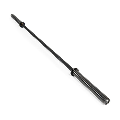 A Bells of Steel Powerlifting Bar, crafted from black metal and isolated on a white background, features aggressive knurling in the central textured grip area and smooth rotating sleeves on both ends for weight plates—making it an ideal powerlifting bar designed to meet IPF specifications.