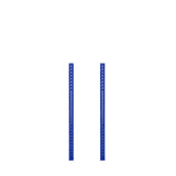 Two vertical Hydra Vertical Uprights by Bells of Steel stand parallel against a white background. Each blue metal bar features multiple evenly spaced holes, indicating they're part of a shelving or support structure.