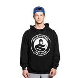 A young man wearing a blue backwards cap and a black Bells of Steel Bamboo Hoodie stands facing forward against a plain white background.