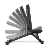Side view of the Buzz-Saw Heavy-Duty Adjustable Bench by Bells of Steel, featuring premium vinyl upholstery and multiple backrest angles from flat to upright for stability. The black bench is displayed on a white background.