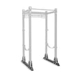 The silver and black Manticore Flat Foot Components by Bells of Steel feature multiple holes for adjustable attachments, a top pull-up bar, bottom support bands, and showcase a reinforced design with the brand name on the upper section.