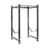 The Bells of Steel Hydra Four Post Power Rack - Prebuilt (3" x 3", ⅝" Holes) is a black metal power rack with adjustable holes, pull-up bar, and safety straps—ideal for weightlifting and strength training in any home gym.