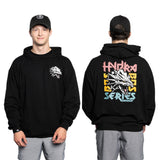 A man wears a black Bells of Steel Bamboo Hoodie and black cap, shown front and back. The hoodie features a white dragon on the chest and a large, colorful “Hydra Bass Series” graphic on the back.