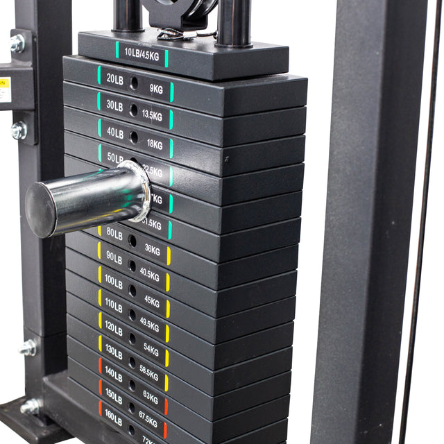 Close-up of a Bells of Steel Weight Stack Pin set at 50 lb on a cable machine, with each plate labeled in pounds and kilograms and colored micro loading markers visible along the side.