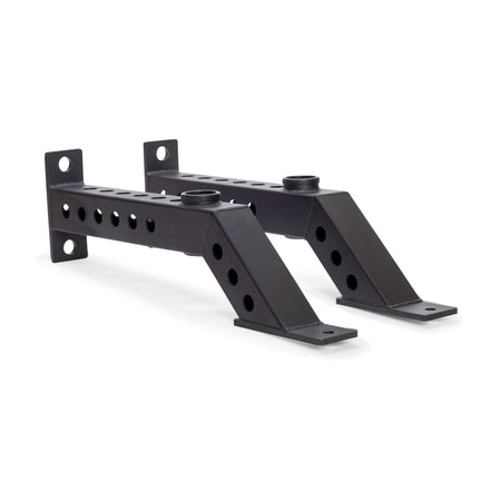 Two black metal Front Foot Stabilizers by Bells of Steel, angled with multiple holes for adjustable mounting, are shown side by side on a white background.