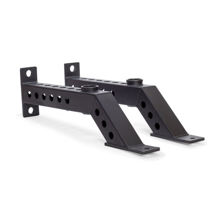Two black metal Front Foot Stabilizers by Bells of Steel, angled with multiple holes for adjustable mounting, are shown side by side on a white background.