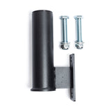 The Bells of Steel Vertical Mount Barbell Holder Rack Attachment, featuring a black metal bracket with a cylindrical holder, stands next to two silver bolts with nuts. Its flat, perforated base facilitates easy mounting on your power rack, making it ideal for home gym organization against the contrasting white background.