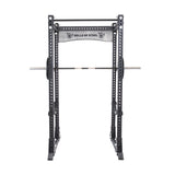 The Bells of Steel Manticore Flat Foot Power Rack offers a 1,000-pound capacity, adjustable safety bars, modular components, a pull-up bar, and a barbell set on hooks, making it ideal for strength training.