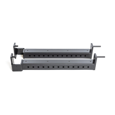 Two Bells of Steel Flip-Down Safeties, black metal adjustable brackets with multiple mounting holes, are shown parallel on a white background.