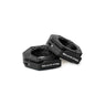 Two black, hexagonal Magnetic Clamp Collars by Bells of Steel with white logo text are displayed on a white background—one standing upright, the other leaning—showing how they securely hold weight plates in place.