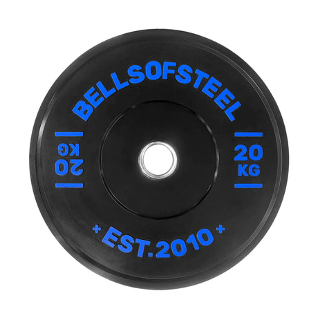 The Dead Bounce Conflict Bumper Plate by Bells of Steel is a black plate made from durable virgin rubber, featuring blue text ("BELLS OF STEEL," "20 KG," "0.9," "EST. 2010") and a central hole for easy barbell mounting—perfect for lifters.