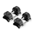 Two Nuobell NÜOBELL Adjustable Dumbbells with patent-pending design and machined steel weight plates are side by side on a white background, featuring sleek silver handles, modern lines, and multiple attached weights.