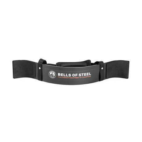 The Bells of Steel Arm Blaster is black with padded straps and “BELLS OF STEEL, THE STRENGTH EQUIPMENT OF CHAMPIONS” on the front, designed to provide superior support during bicep curls and weightlifting.