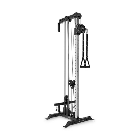 The Bells of Steel Cable Tower is a black and silver strength training machine with adjustable pulleys and handles, designed for home gyms, standing securely on a sturdy base.